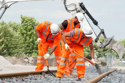 Amey employees working on a rail way.